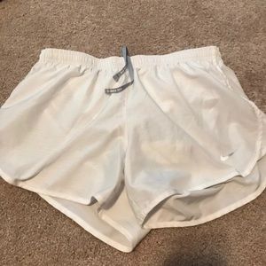 White nike running shorts